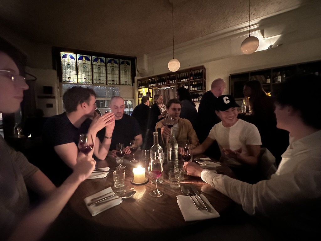a group sharing dinner at a restaurant